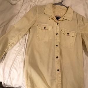 Muted yellow button down.